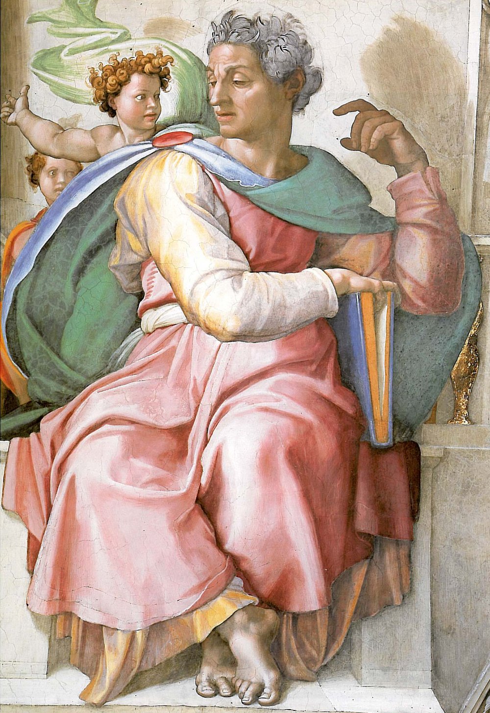 O profeta Isaías sentado, com um rolo na mão, voltando-se para ouvir, em afresco de Michelangelo
