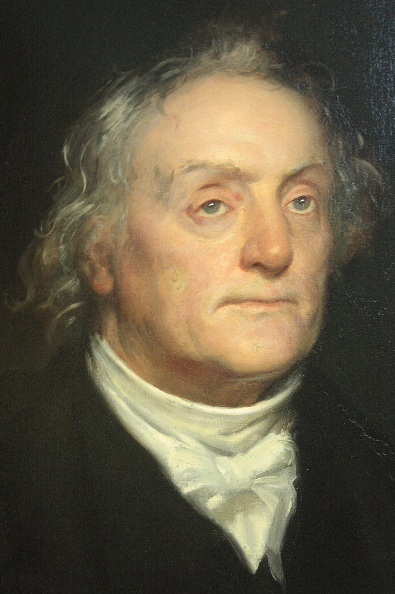 Retrato a óleo do reverendo Thomas Chalmers, em traje escuro de pastor, em pose de meio corpo