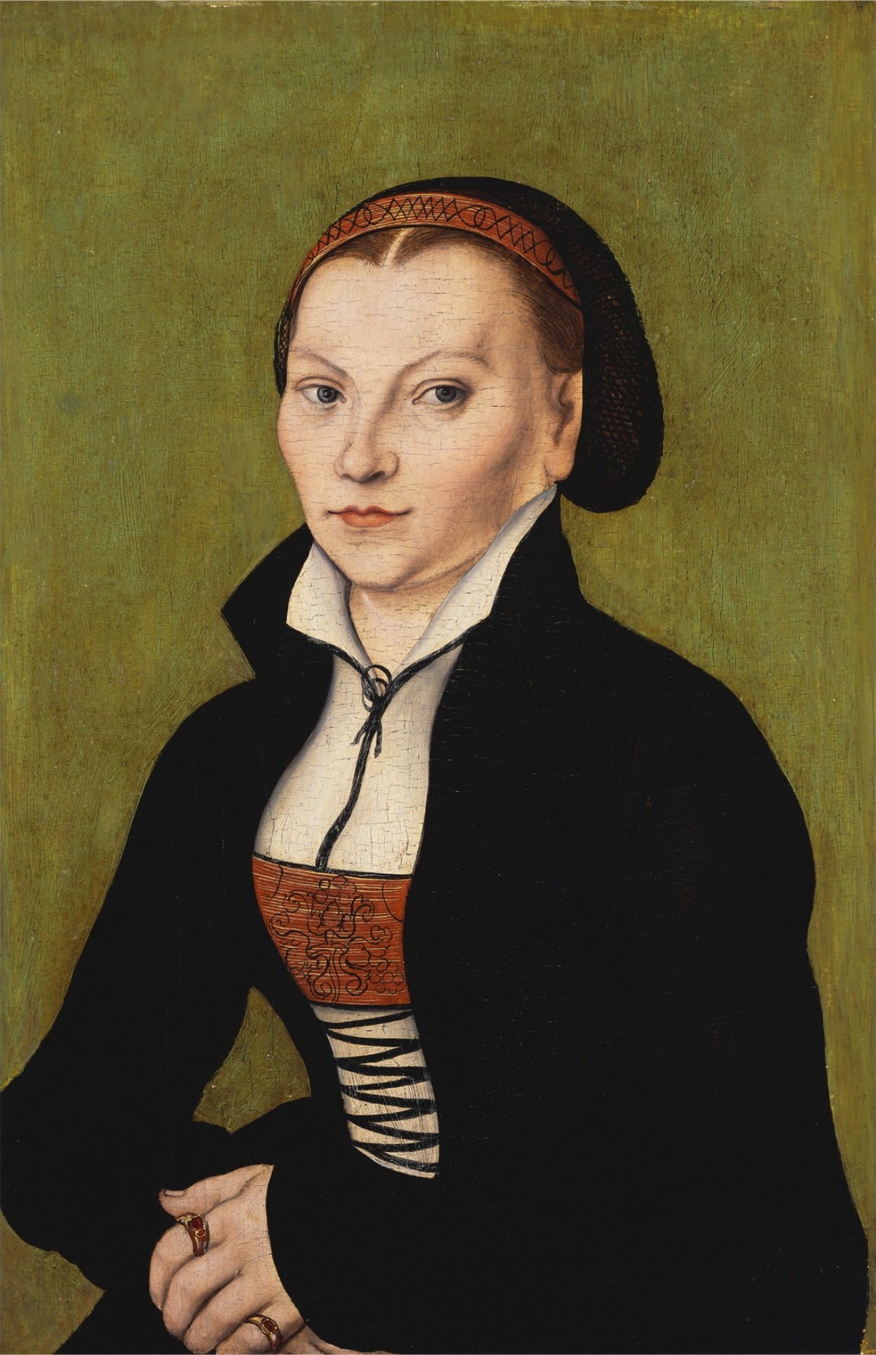 Retrato de Katharina von Bora, de touca e vestido escuro, pintado por Lucas Cranach, o Velho