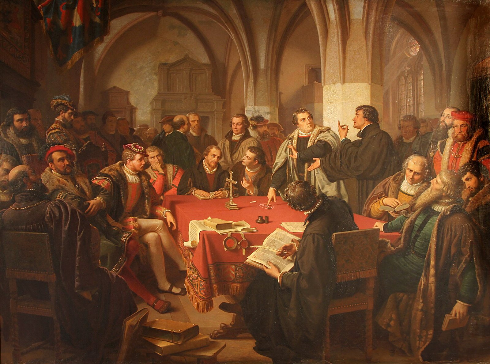 Pintura do colóquio de Marburgo, com Lutero e Zuínglio à mesa diante dos demais teólogos e do landgrave Filipe de Hesse